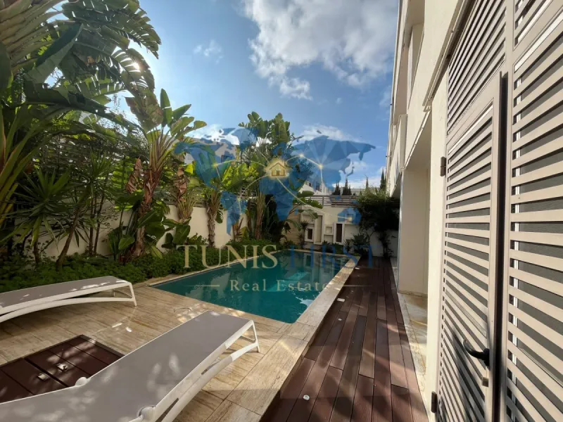 A vendre appartement S+2 avec jardins et piscine à Gammarth — Gammarth